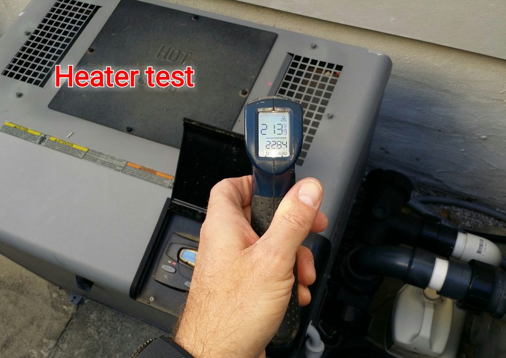 home inspector testing a heater during an inspection