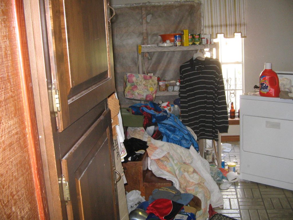 dirty laundry room during a home inspection