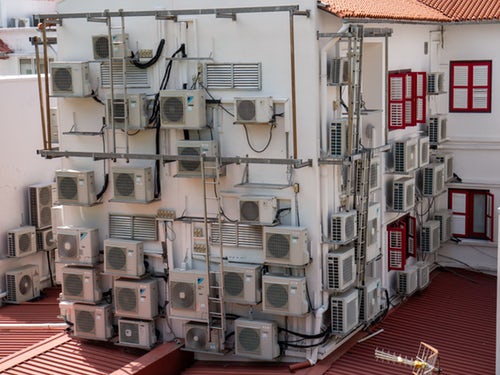 Inspecting AC units during a home inspection