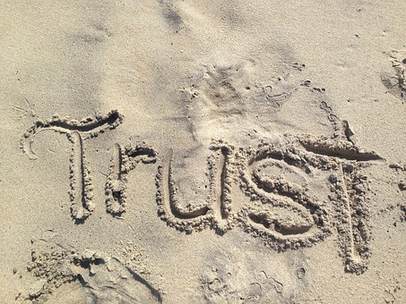 pic of trust written in sand