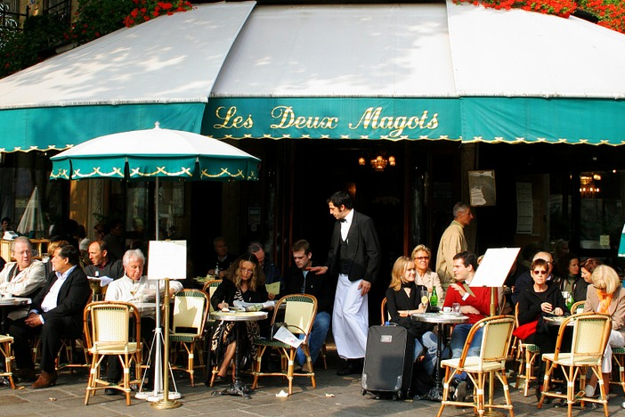 waiter serving a table full of home inspectors